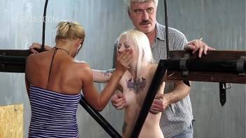 Blonde slave in BDSM action